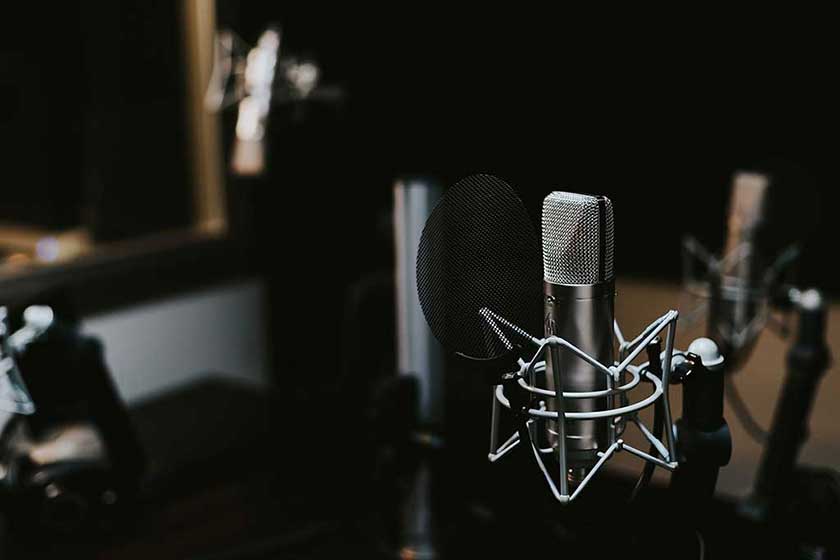 A studio microphone in a recording booth